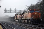 Westbound rock train through the fog